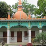 A picture of a buddhist temple in Shantiniketan, a scenic destination