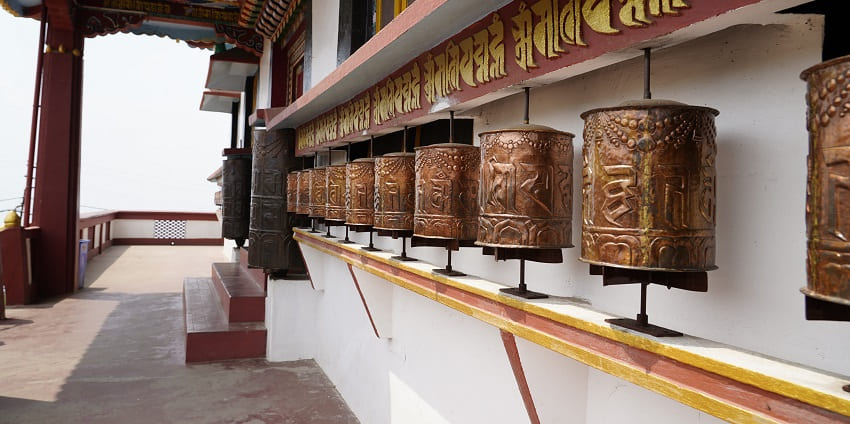 An image of Prayer Bells on the wall of Durpin Monastery showcasing stunning designs.