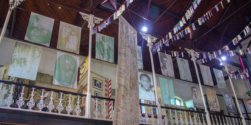 Learn history at District Six Museum through photographs, handwritten letters, and testimonials.