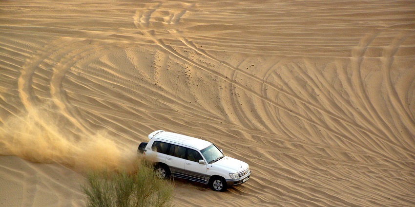 Things to do in Qatar include Dune Bashing, a thrilling desert adventure with off-road driving on dunes.
