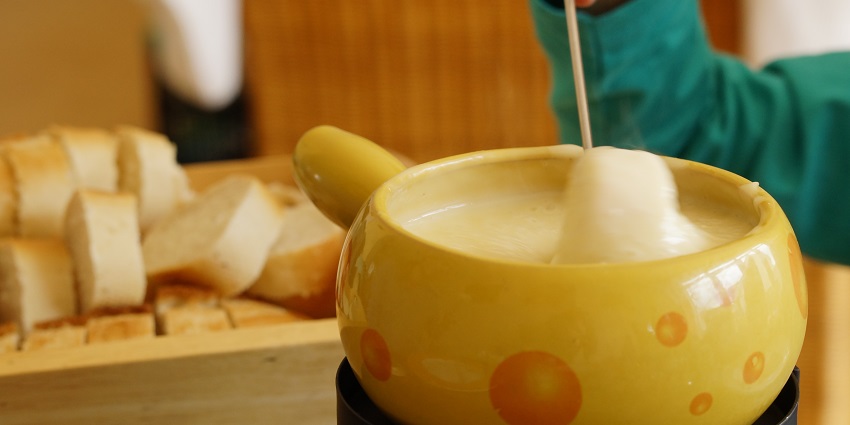 Delicious Swiss fondue experience in cozy, authentic restaurant setting