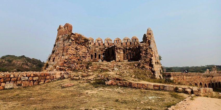 the ruins of tughlaqabad fort speaking about the lost glory of kingdoms for travellers.