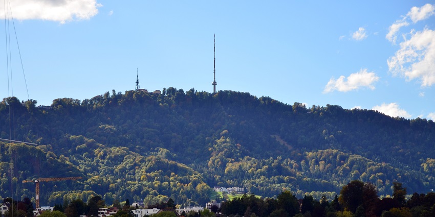 Panoramic mountain offering hiking trails and views of Zurich.
