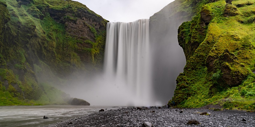 An image of a waterfall which resembles the Uluwehi Falls, one of the Kauai waterfalls.