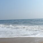 A picture of a serene beach in Chennai with a vast sea in front