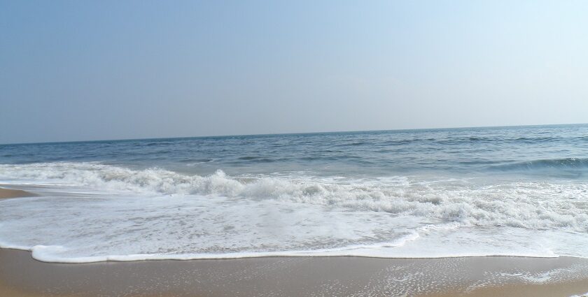 A picture of a serene beach in Chennai with a vast sea in front