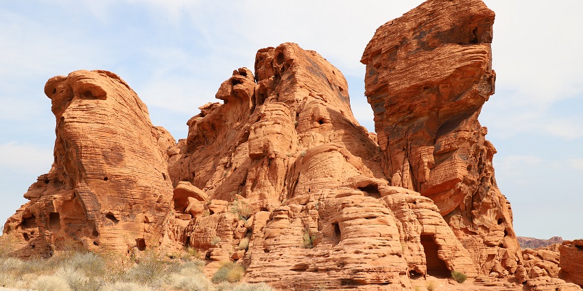Valley of Fire State Park with tall sandy, orange, unique stone structures and caves