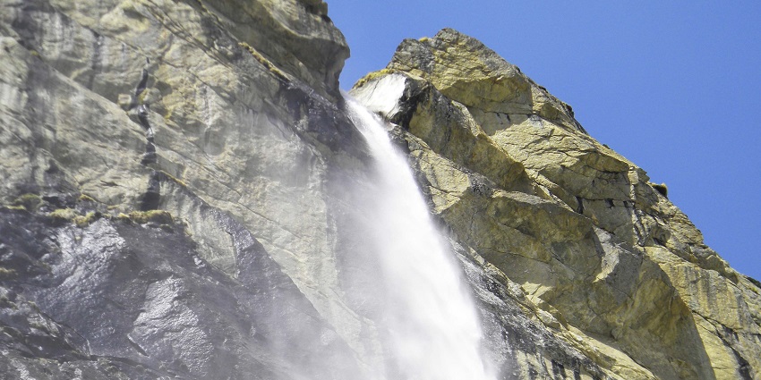 Water flowing down Vasudhara Falls, near Gopinath Temple in Chamoli
