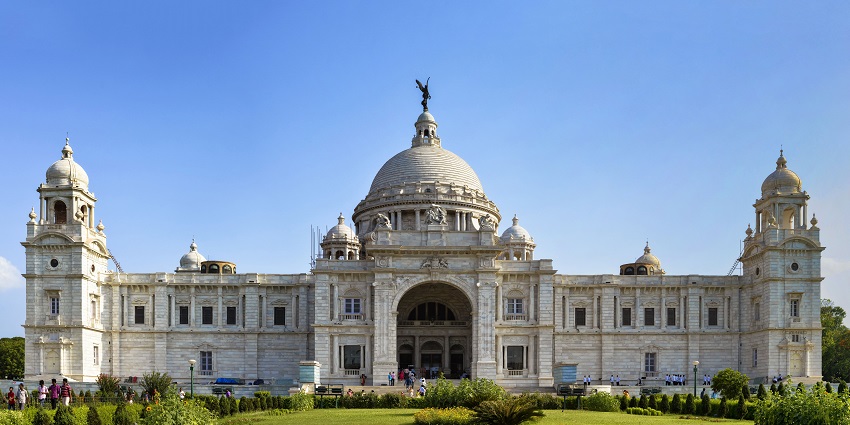 A beautiful view of Victoria Memorial with lush gardens surrounding it