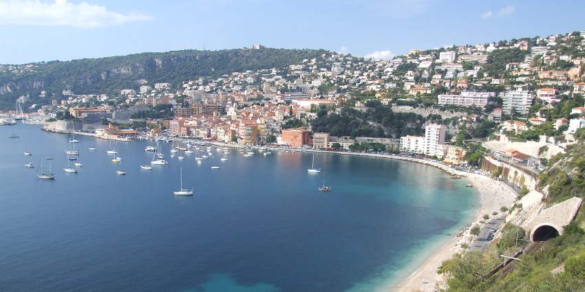 Discover Villefranche-sur-Mer Beach's charming bay and crystal-clear waters