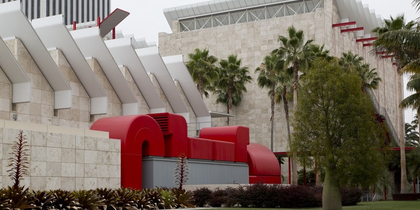 Los Angeles County Museum of Art with unique red and white architecture and palm trees