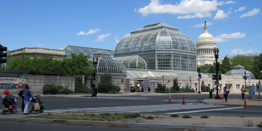 An outside view of the United States Botanic Garden showcasing its dome structure