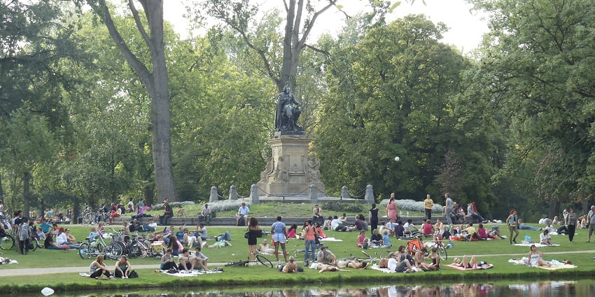 Iconic urban park with walking paths, ponds, and outdoor cafes in Vondelpark, Amsterdam.