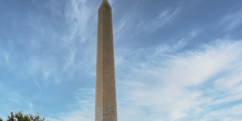 A distant view of the Washington Monument, which is standing tall on the National Mall.