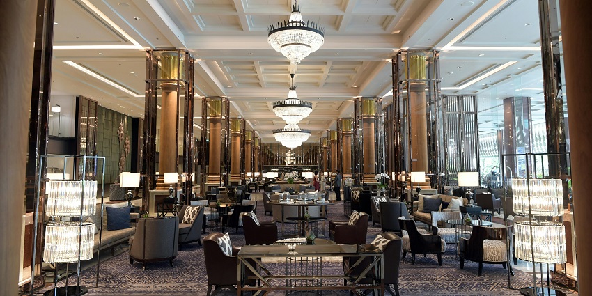 A dining setup with brown tables and chairs setup creates a vibrant atmosphere.
