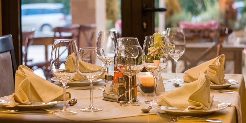 An image of modern restaurant interiors with stylish furniture and well-arranged seating