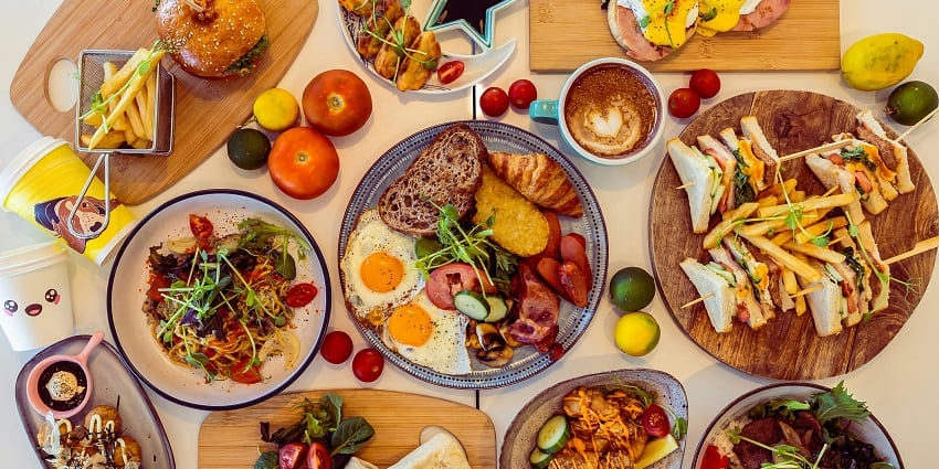 Try yummy and delicious food at a restaurant offering several local flavours of the country.