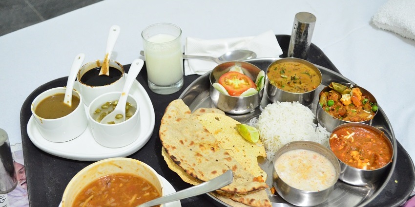 Savor local cuisine near Pithoragarh Fort, Uttarakhand.