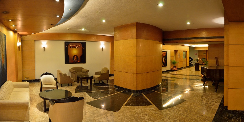 A picture of a lounge near Nehru Children's Museum, with elegant seating and ambient lighting.