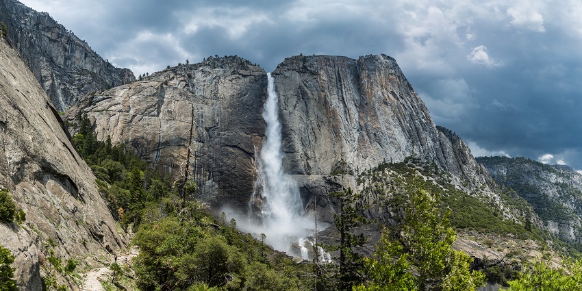 Yosemite Falls from the trail, a popular waterfall in the US, showcases its majestic beauty.