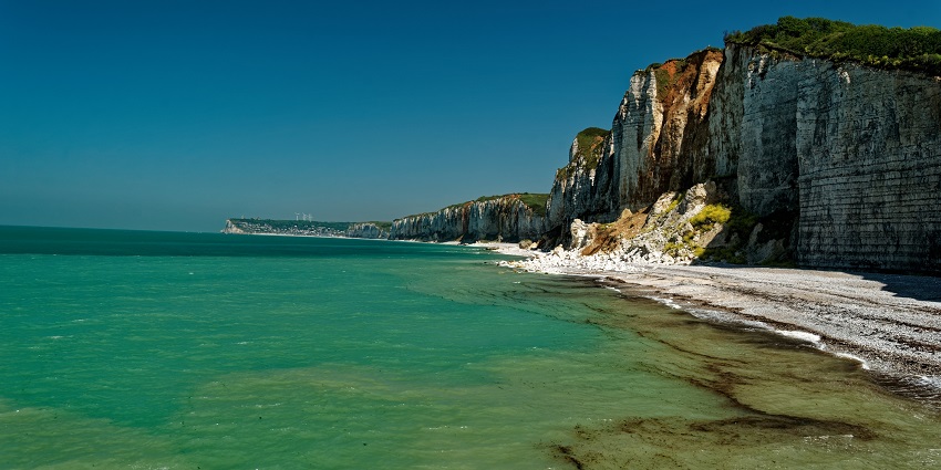 Image of the peaceful beach and surrounded by crystal clear water