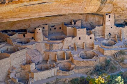 A breathtaking view of Mesa Verde National Park, featuring a rugged cliffside.