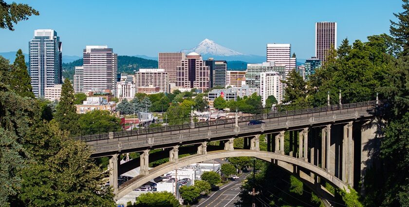 An aerial view of Portland shows snow-covered Mount Hood in the background, Oregon.