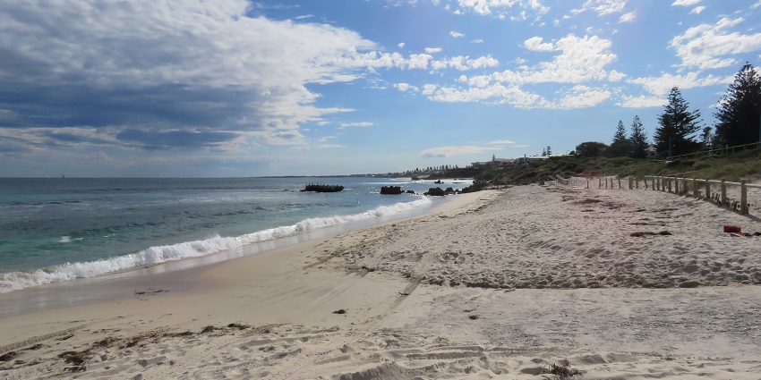 This Perth Beach is a Surfers' paradise with powerful waves and a scenic coastline