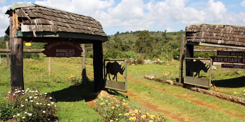 Wandare gate is located with a sign of rhinos hanging inside the Aberdare National Park.