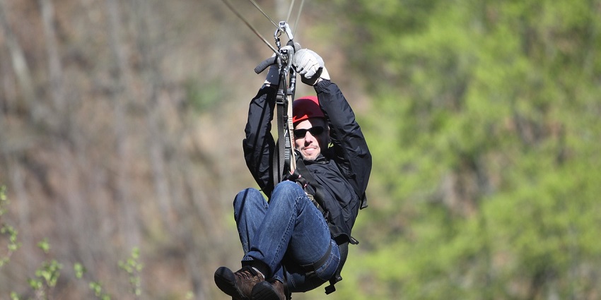 Zip lining activity performed by individuals at the De Adventure Park in Haryana.