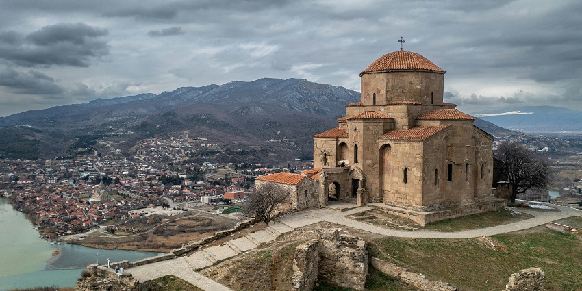 Tbilisi is a scenic city nestled by the Caucasus Mountains and river