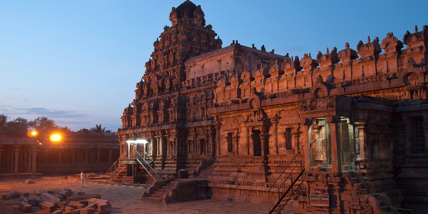 Airavatesvara Temple with detailed Dravidian architecture and intricate stone carvings