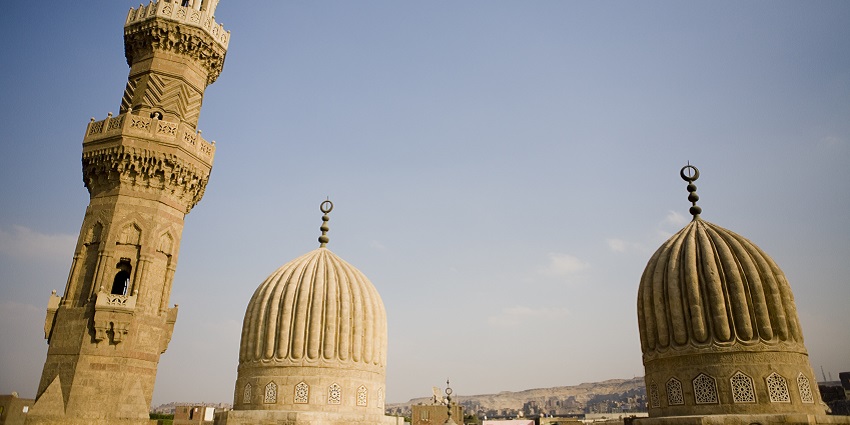 Historic red-stone mosque reflecting unique medieval Islamic architecture.