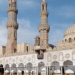 Inside view of Al Azhar Mosque where people are present in the courtyard of the mosque.