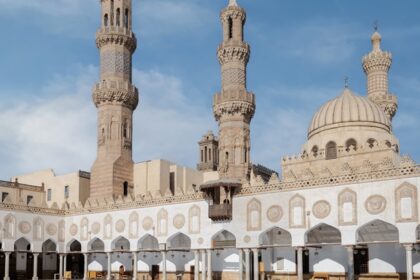 Inside view of Al Azhar Mosque where people are present in the courtyard of the mosque.