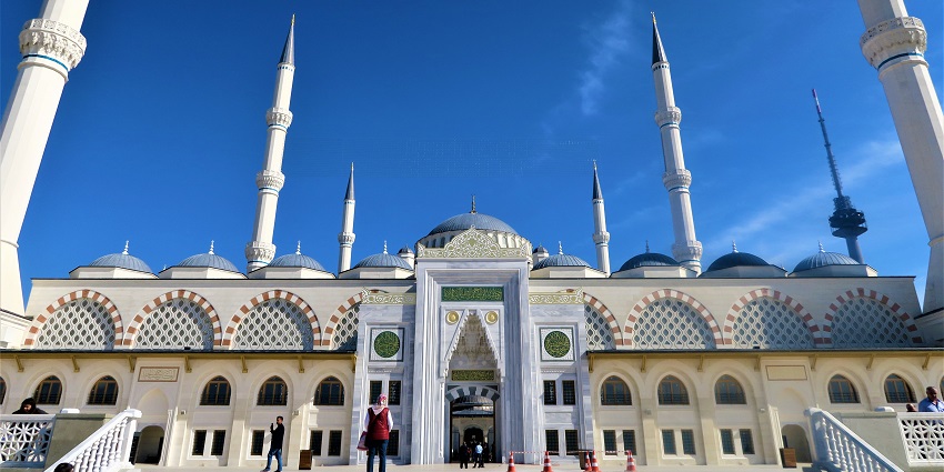 Historic mosque near ancient petroglyphs, combining history and spirituality.