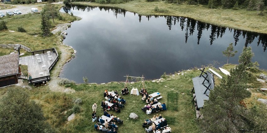 An aerial view of people relaxing and picnicking at Amsoi Picnic Spot near Guwahati.