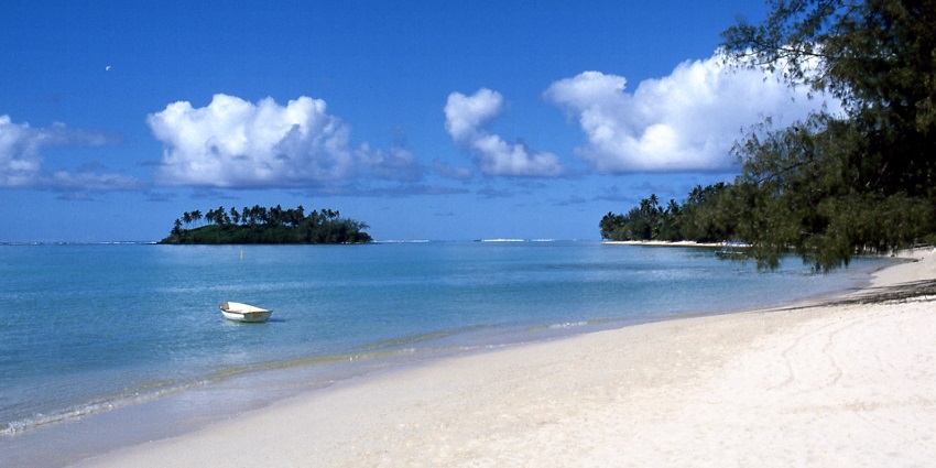 Popular beach in Rarotonga, known for turquoise waters and activities.