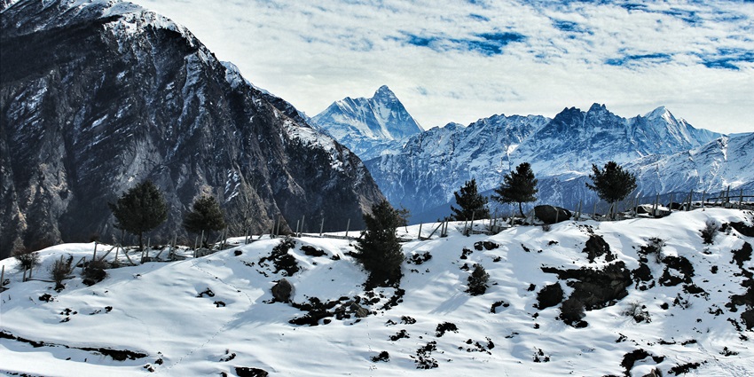 A picture of the snow-capped mountains of Auli - One of the best places to visit in Garhwal
