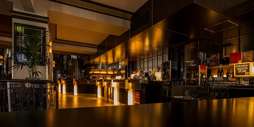 Image of a bar filled with lights, like the B5 Bar, ideal for Iceland nightlife for couples