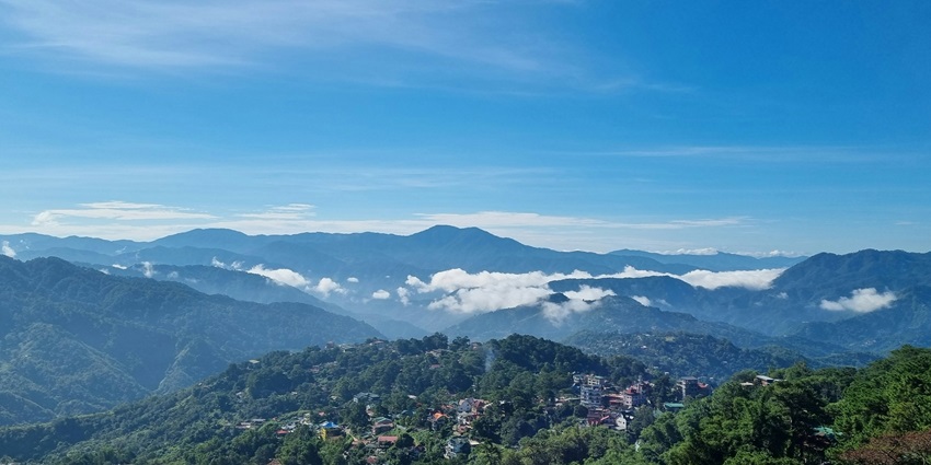 Baguio is the pine-covered mountains, cool weather, and the summer capital charm.