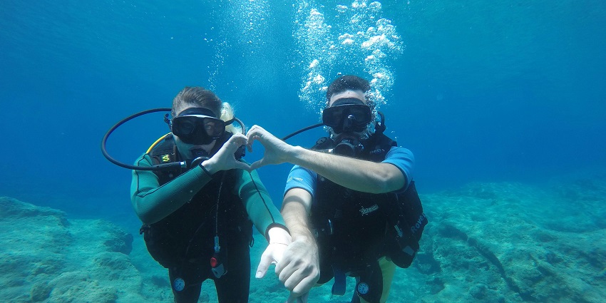 Captivating bay offering clear waters, perfect for scuba diving in Oman and relaxation.