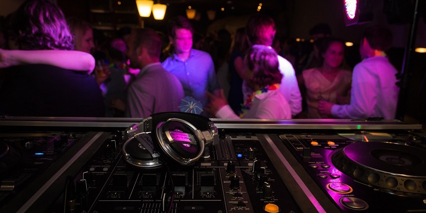 Image of DJ system in a club with unique mirror ball at Bar The Clinic in Santiago