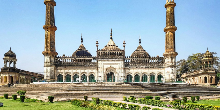 Picturesque view of Bara Imambara Mosque in India with garden in front during day time