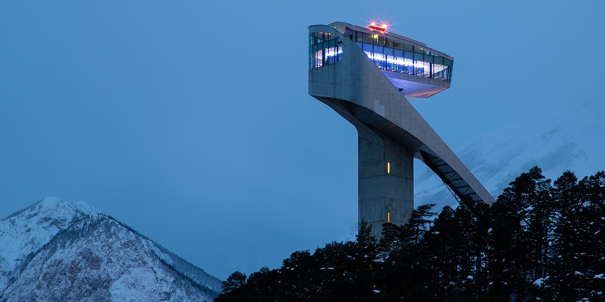 An image of the Bergisel Ski Jump tower with panoramic views of Innsbruck and the Alps.