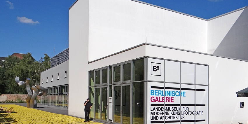  Berlinische Galerie complex with its name written on the wall and a man standing outside
