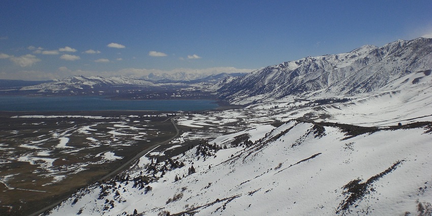 The panoramic view of snow-capped mountains.