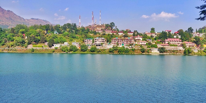 A wide view of the greenish-blue waters at Bhimtal Lake in Nainital, Uttrakhand.