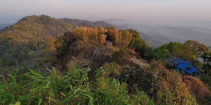An image of Biharinath including a beautiful garden path stretching further into the landscape.