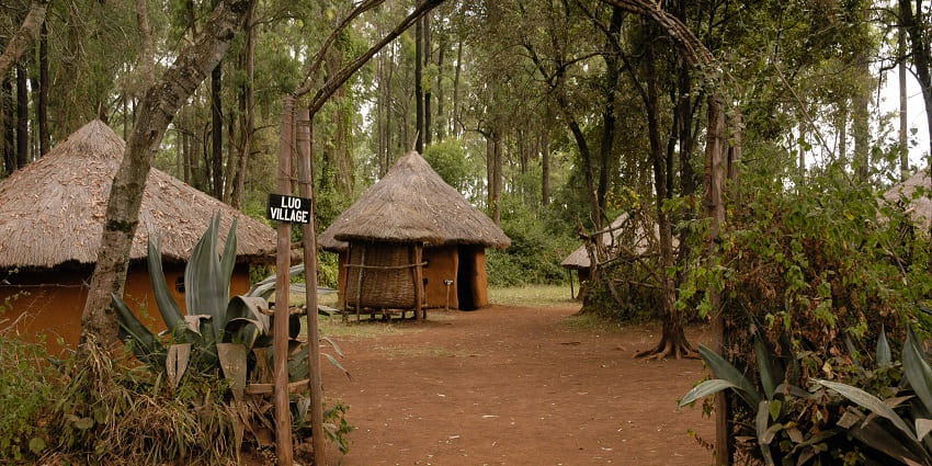 Replica of tribal villages named Luo village with small huts in the bomas of Kenya.